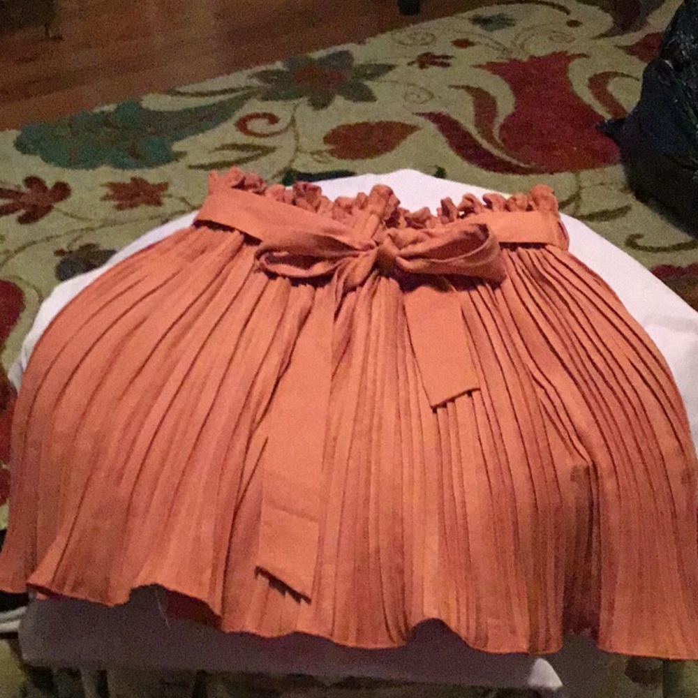 Haute MondeTangerine pleated skirt